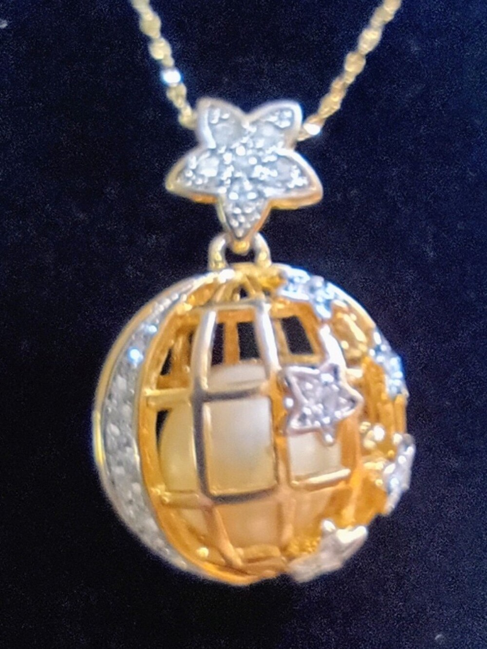 Gold Toned Globe With Round Faux Pearl Necklace